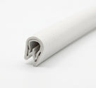 Cut length of white textured PVC edging strip shown end-on with the metal insert visible