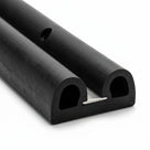 Black double-D fender profile with a fixing hole and visible steel insert strip in the hollow base