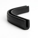 Black EPDM U-channel profile shown as coiled S-curved length