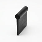 Black rubber welt seal with round bead on flat flange, angled studio shot