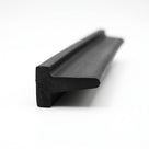 Black rubber T-section profile, angled close-up studio shot