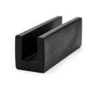 Black neoprene U-channel profile coiled, angled view of square-ended groove