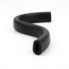 Black EPDM U-channel profile coiled, S-curved length showing teardrop-shaped groove