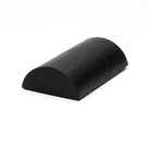 Black solid neoprene half-round block section, smooth cut end on a white studio background