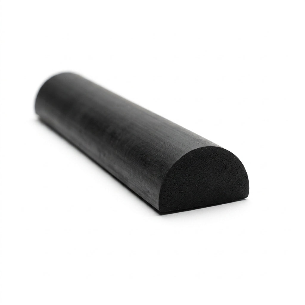 Short length of black rubber half-round bar, angled studio shot