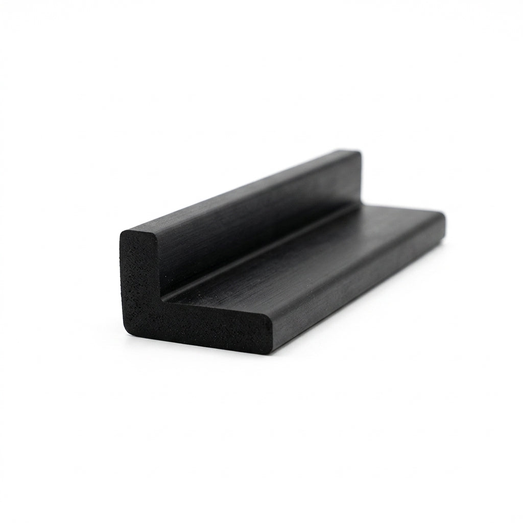 Short cut length of black rubber angle extrusion angled on white background