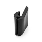 Black EPDM U-channel profile standing upright, asymmetric hook-shaped cross-section visible