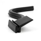 S-curved length of black rubber T-section with angled flap and slotted base