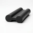 Black rubber double ended piping shown as a dumbbell-shaped extruded profile
