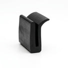 Black EPDM channel with flange, plain white background shot of curved profile standing upright