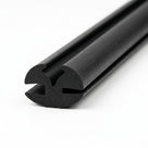 Black EPDM weatherstrip shown end-on, dual ribbed channel profile close-up