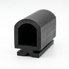 Angled studio shot of a large black EPDM D-section seal with a winged T-shaped mounting foot.