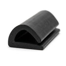 Black rubber wrap-over section with rounded hood, angled studio shot