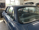 Rear windscreen seal fitted to a blue classic Jaguar saloon
