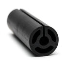 Black neoprene slit round channel coiled, end-on view showing hollow bore and axial slit