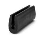 Black neoprene U-channel profile standing upright, angled studio shot with side grip slot