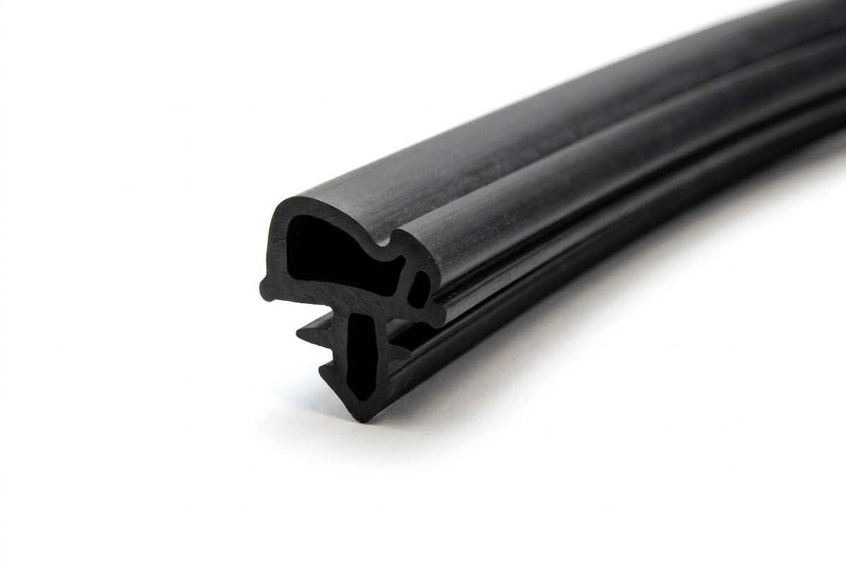 Black rubber windscreen seal with barbed fin, angled length shot on white background