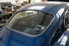 Rear windscreen seal fitted to a dark blue classic Jaguar E-Type