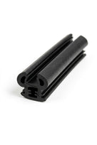 Black quarterlight seal profile with twin tube design, angled studio shot