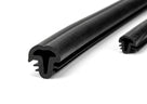 Two black rubber windscreen seal lengths with T-shaped barbed fin, coiled on white background