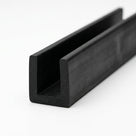 Black EPDM edge trim profile coiled, angled view of square-ended U groove