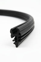 Black windscreen surround coiled into a loop, angled studio shot