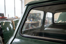 Black windscreen seal fitted around the screen of a green Mini Mk1