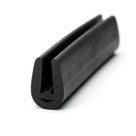 Black EPDM U-channel profile coiled, angled view of rounded teardrop-shaped groove