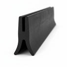 Black rubber double channel seal extrusion showing Y-shaped cross-section, studio shot