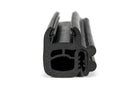End-on view of black windscreen seal profile, studio white background