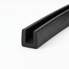 Black EPDM U-channel profile coiled, angled view of square-ended groove
