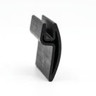 Black EPDM channel with flange, angled shot of Y-shaped profile end on white background