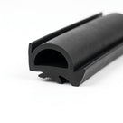 Black rubber pillar seal profile with serrated fixing edge, close-up studio shot