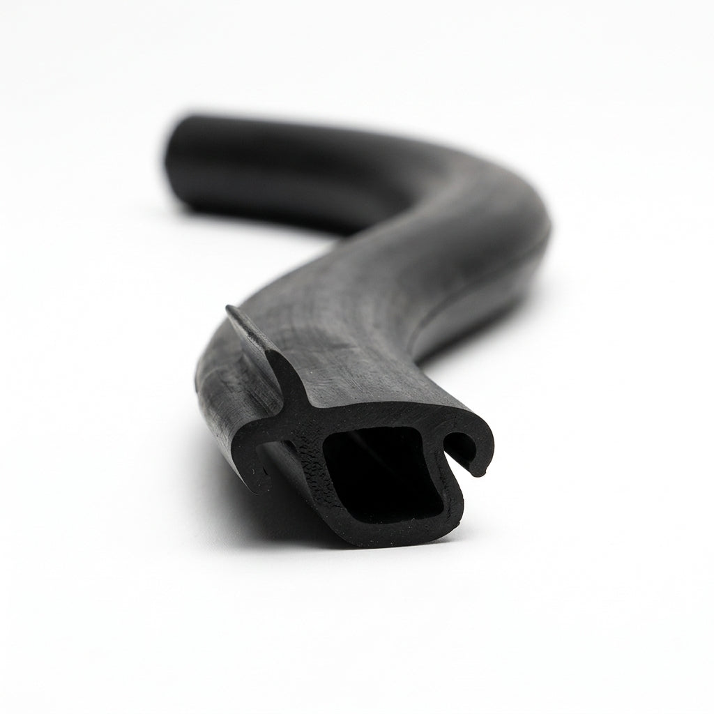 S-curved length of black rubber block section showing hollow bulb and side hook
