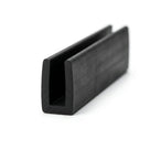 Black rubber U-channel profile coiled, angled view of square-ended groove