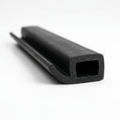 Length of black rubber hood stowage seal with hollow square bulb, studio shot
