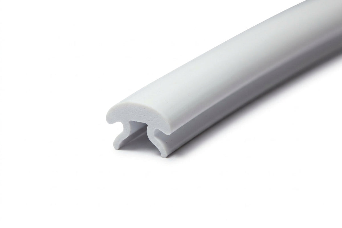 Light grey PVC Herzim strip shown curved, close-up of the moulded trim profile