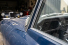 Herzim strip fitted as chrome-look trim along a blue classic car's window edge