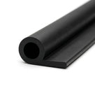 Black hollow P section rubber extrusion, angled studio close-up