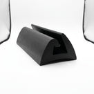 Black PVC awning rail seal shown as a short cut length at an angle on white background