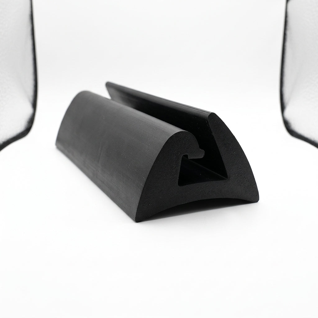 Black PVC awning rail seal shown as a short cut length at an angle on white background