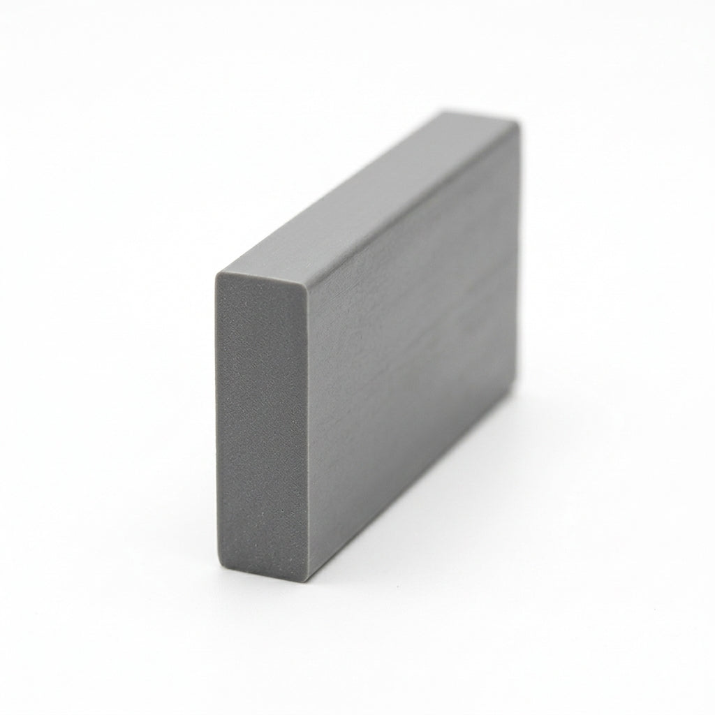 Grey PVC flat panel insert standing upright, viewed at an angle on white background