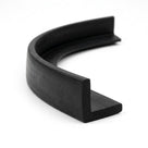 Coiled length of black rubber L-section extrusion curved into a loop