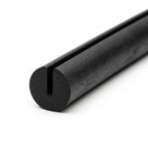 Coiled length of black EPDM corded U-channel, end-on view showing round slotted profile