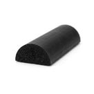 Black half-round sponge rubber section at an angle, cut end showing porous cell structure