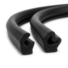 Two coiled black sponge rubber lengths showing different hook-shaped profiles