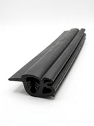 Black rubber windscreen to body seal, coiled length showing twin-chamber profile