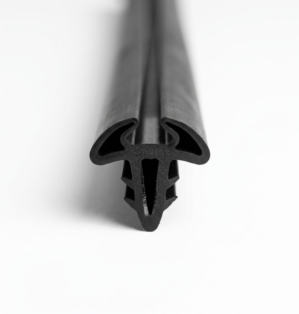 Black trim shown end-on with twin hollow lips and a central locking fin
