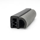 Cut length of black self grip rubber trim with metal-reinforced grip and grey sponge bulb, angled shot