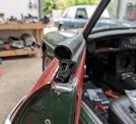 Self-grip seal fitted to a classic car barn door edge in a workshop